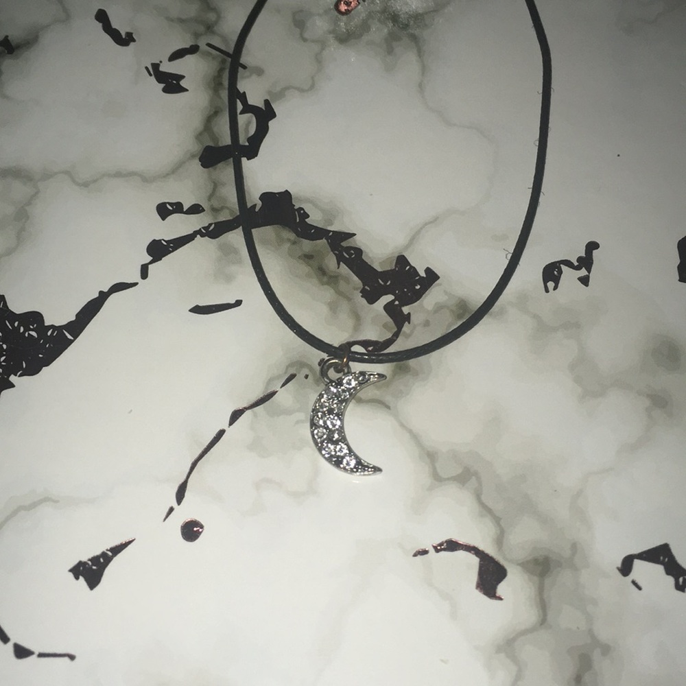 A crescent moon necklace
